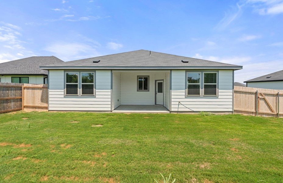 Front exterior of a new home in County View, Temple, TX, highlighting curb appeal (Image 22). Front exterior of a new home in County View, Temple, TX, highlighting curb appeal (Image 22).