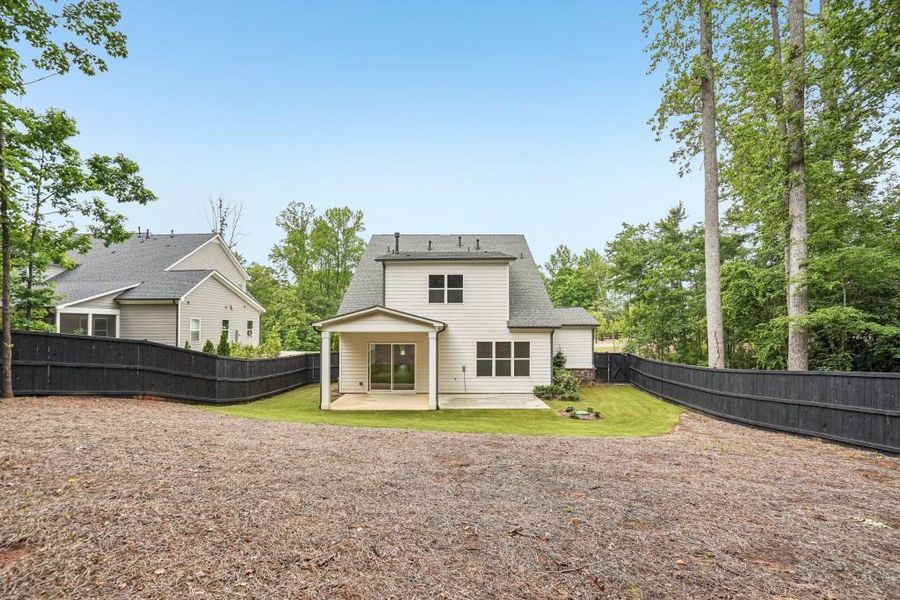 Exterior details and patio area of a home in Arden on Lanier, Cumming (Image 4).