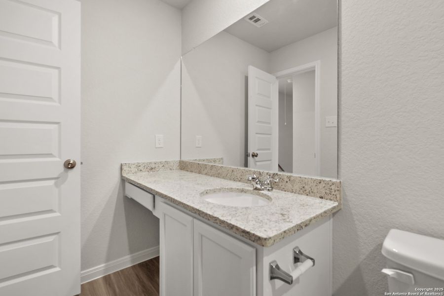 Furnished interior view inside a new home in Abbott Place, St. Hedwig (Image 8).