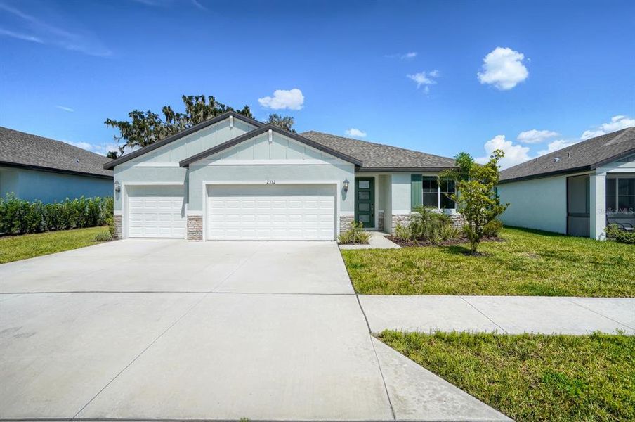 Front exterior of a new home in , Bartow, FL, highlighting curb appeal (Image 19). Front exterior of a new home in , Bartow, FL, highlighting curb appeal (Image 19).