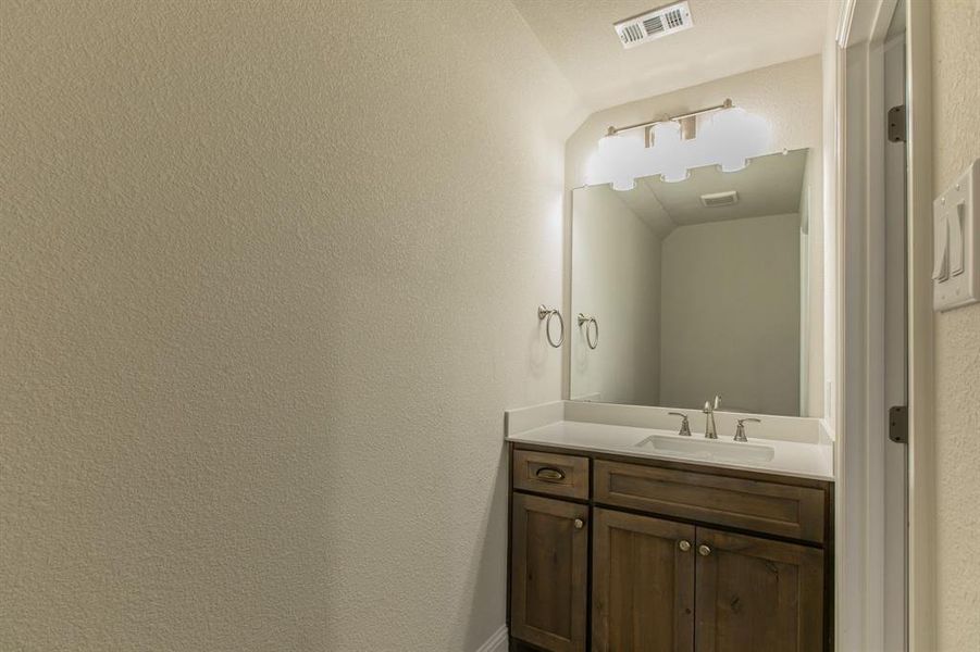 Half bath upstairs next to living room