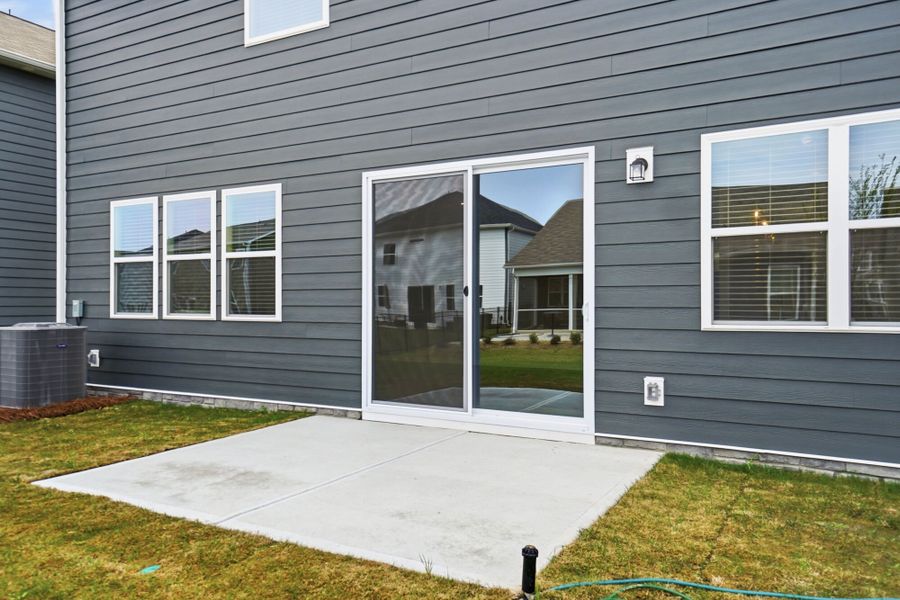 Exterior details and patio area of a home in Waxhaw Landing, Monroe (Image 4).