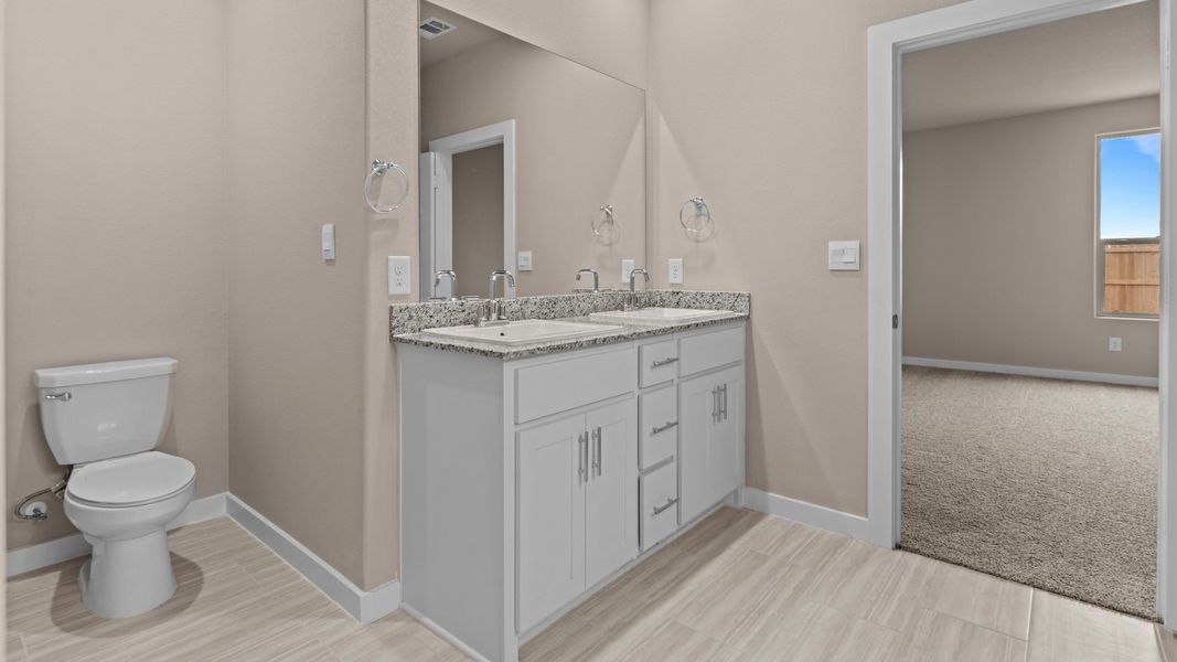 Representative furnished interior of a home built from the Shelby by D.R. Horton in Legacy South, Midland (Image 6).