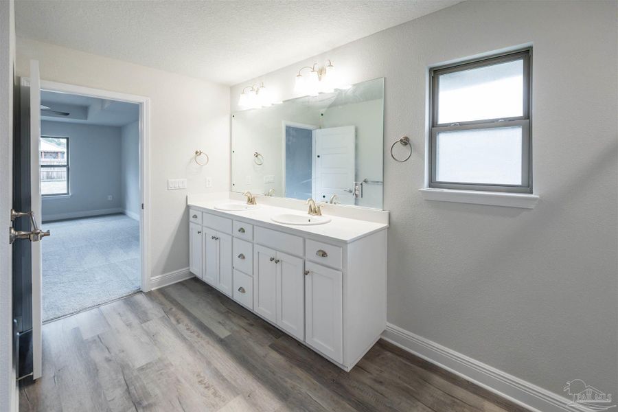 Representative furnished interior of a home built from the Plan 2313 by Adams Homes in Ashton View, Crestview (Image 9).