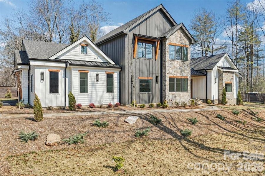 Front exterior of a new home in , Brevard, NC, highlighting curb appeal (Image 25).