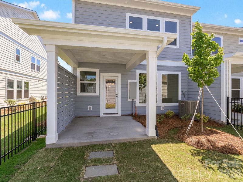 Exterior details and patio area of a home in North Creek Village - Townhomes, Huntersville (Image 18). Exterior details and patio area of a home in North Creek Village - Townhomes, Huntersville (Image 18).