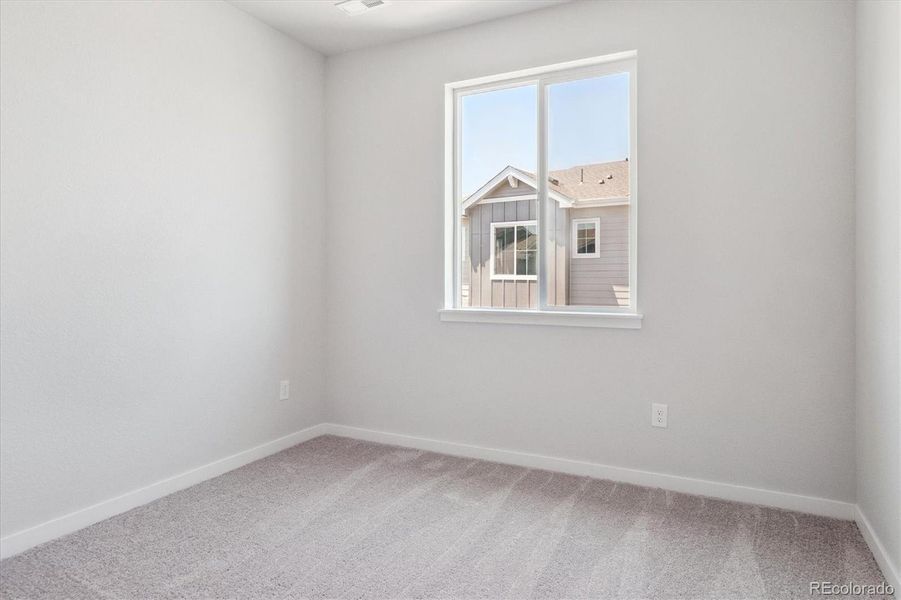 Spacious, unfurnished interior of a new home in Paired Homes at Alder Creek, Parker (Image 9).