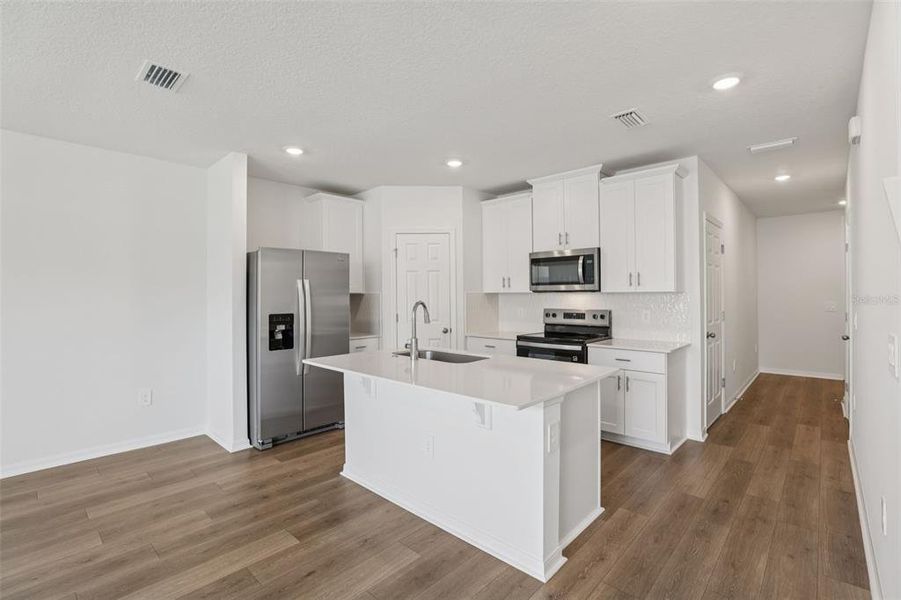 Furnished interior view inside a new home in Cagan Crossings West, Clermont (Image 11).