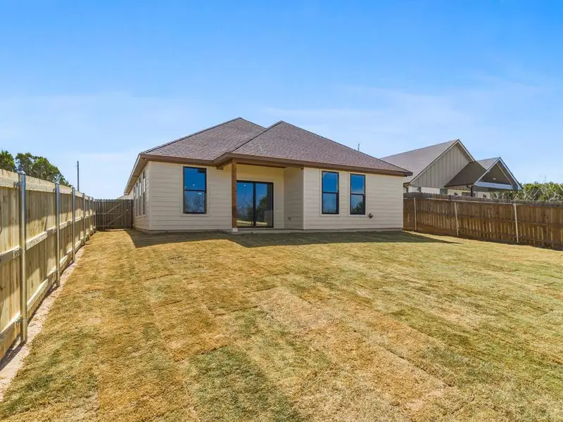 Exterior details and patio area of a home in , Granbury (Image 4).