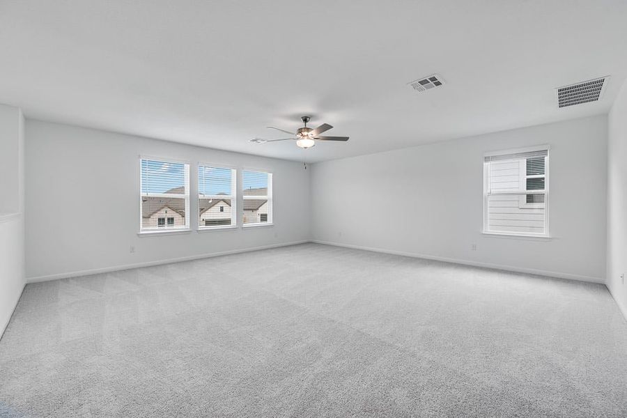 Representative unfurnished interior of a home built from the Wren by Taylor Morrison in Turner's Crossing 50s, Austin (Image 15).