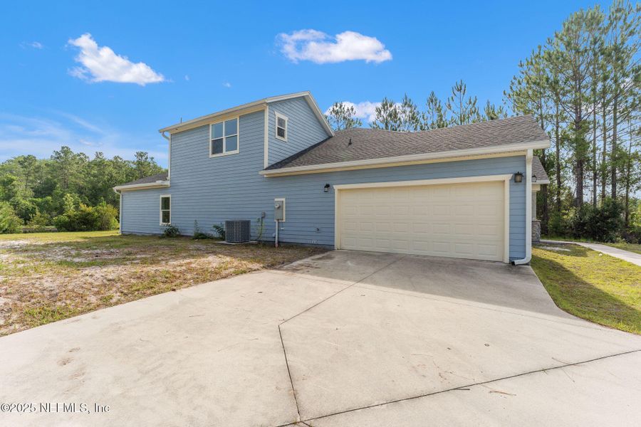 Front exterior of a new home in , Jacksonville, FL, highlighting curb appeal (Image 20).