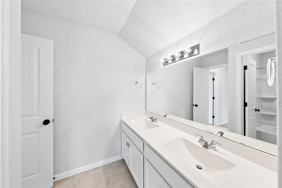 Upstairs guest bath with dual vanities