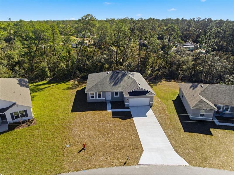 Front exterior of a new home in , Ocala, FL, highlighting curb appeal (Image 20).