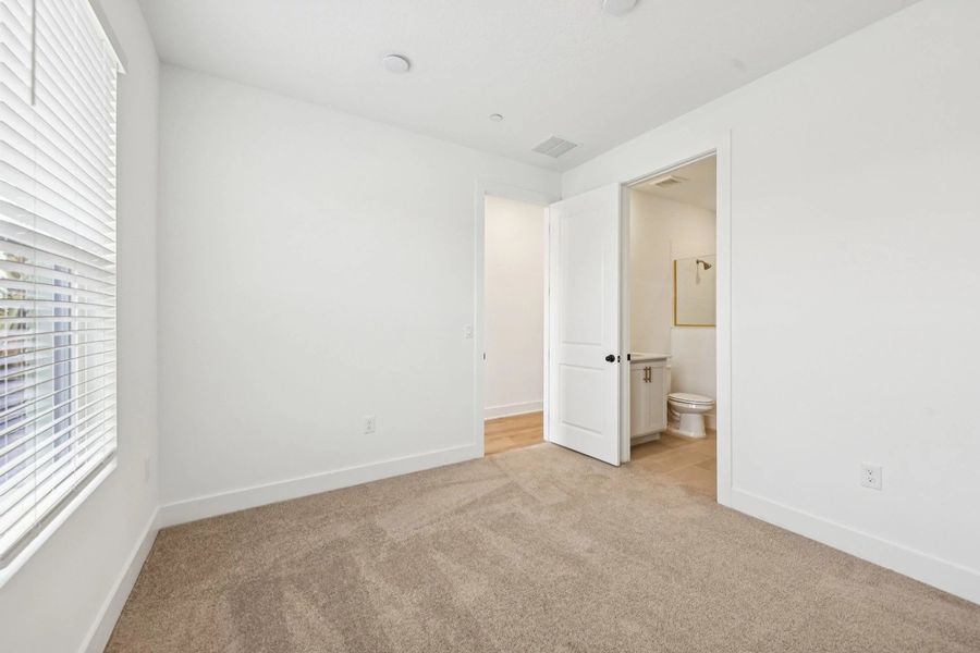 Spacious, unfurnished interior of a new home in Parkview at Hamlin, Winter Garden (Image 14).