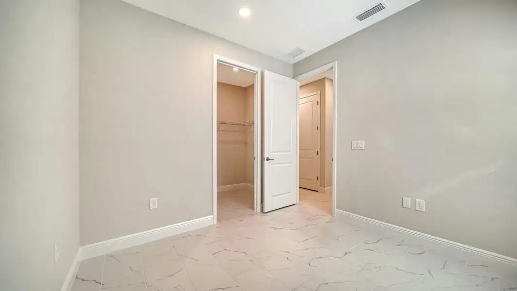 Spacious, unfurnished interior of a new home in Windward Real Estate and Homes for Sale in Sarasota, FL - Neal Communities, Sarasota (Image 37). Spacious, unfurnished interior of a new home in Windward Real Estate and Homes for Sale in Sarasota, FL - Neal Communities, Sarasota (Image 37).