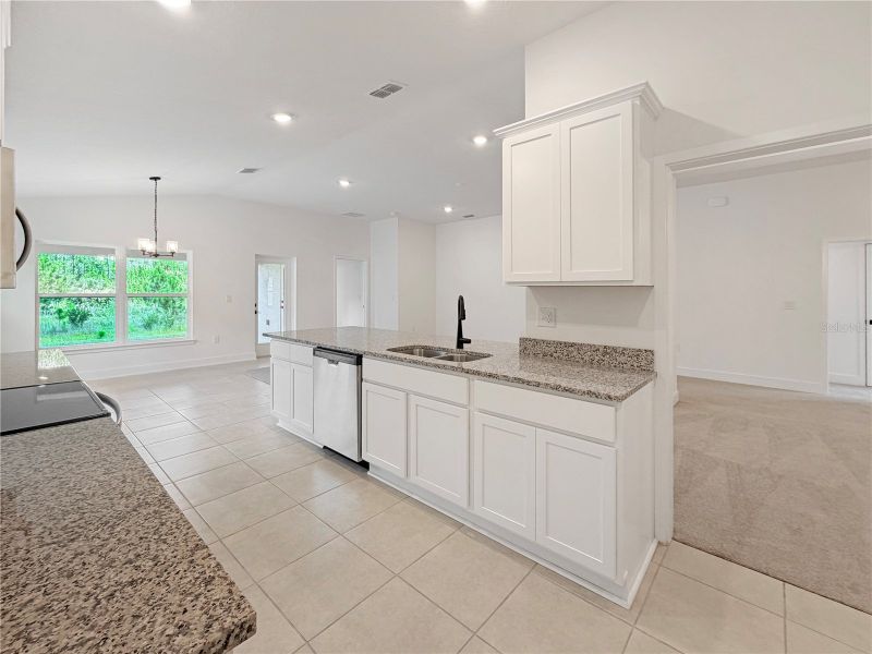 Furnished interior view inside a new home in Harmony Central, Harmony (Image 6).