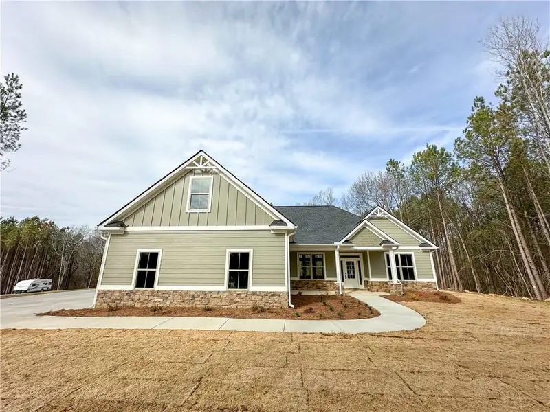 Front exterior of a new home in Stratford, Kingston, GA, highlighting curb appeal (Image 1).