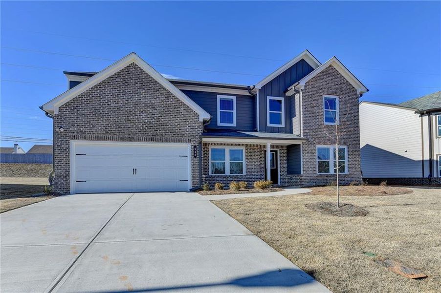 Front exterior of a new home in , Auburn, GA, highlighting curb appeal (Image 2). Front exterior of a new home in , Auburn, GA, highlighting curb appeal (Image 2).