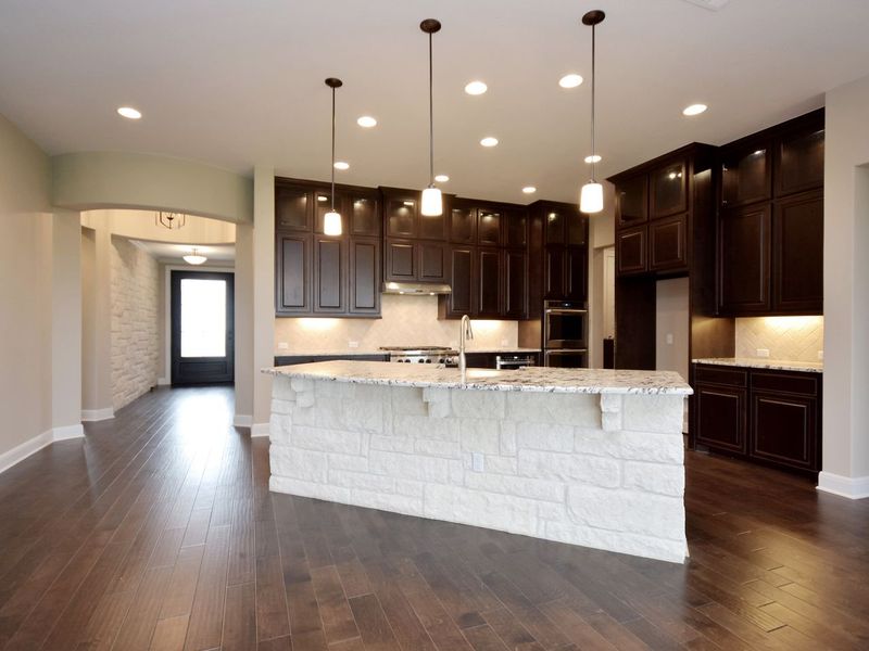 Representative furnished interior of a home built from the Madera II by Giddens Homes in Scofield Farms Estates, Georgetown (Image 216).