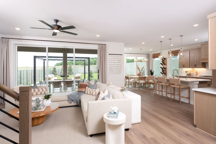 Representative furnished interior of a home built from the Magnolia by Tri Pointe Homes in Landmark, Denton (Image 10).