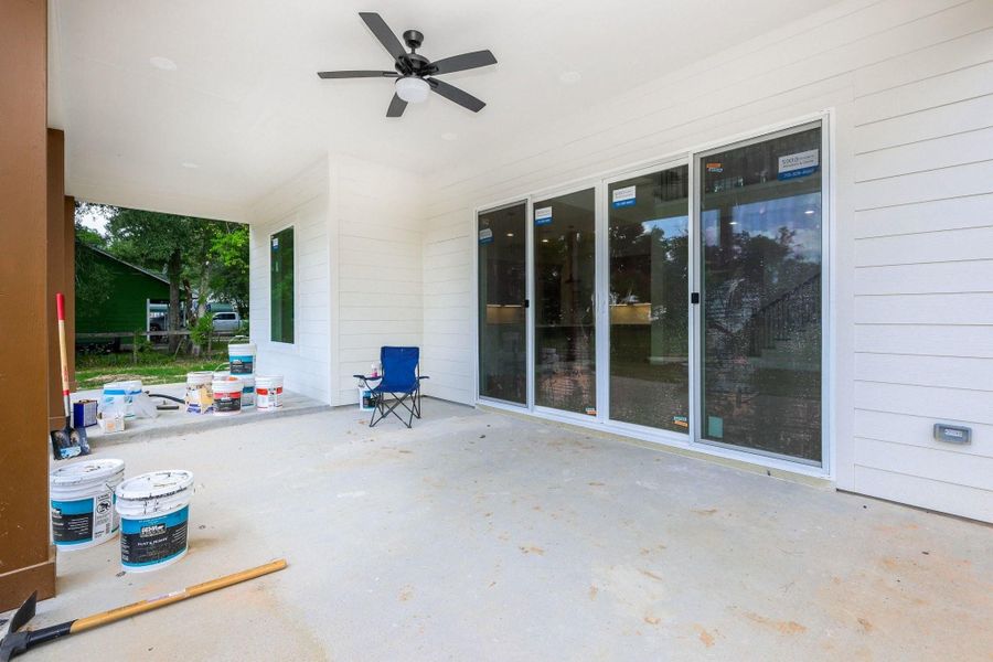 Exterior details and patio area of a home in , Tomball (Image 3).