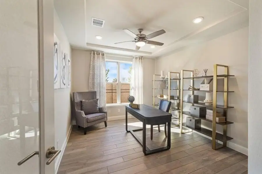 Furnished interior view inside a new home in Bridgeland, Cypress (Image 10).