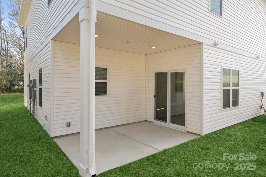 Exterior details and patio area of a home in , Charlotte (Image 3).