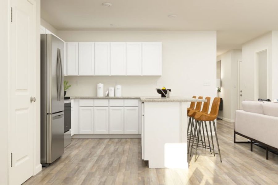 A kitchen with white cabinets. A kitchen with white cabinets.