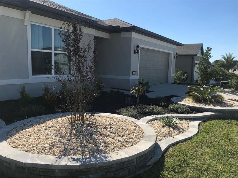 Exterior details and patio area of a home in Del Webb Stone Creek, Ocala (Image 3).