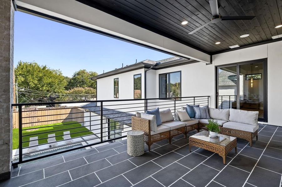 View of patio / terrace with ceiling fan and an outdoor living space View of patio / terrace with ceiling fan and an outdoor living space