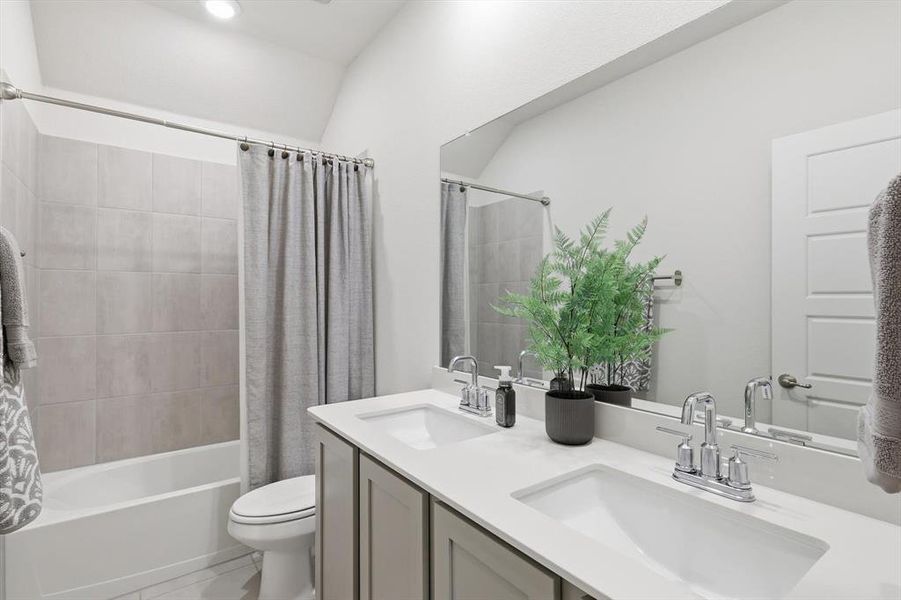Secondary bathroom with dual sinks