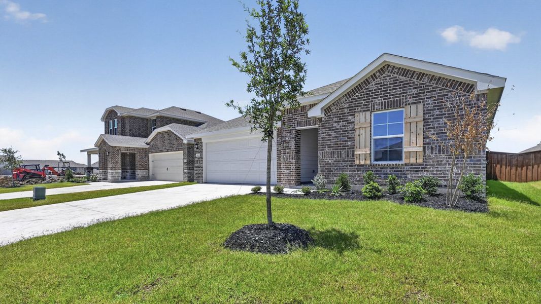 Front exterior of a new home in Sanger Circle, Sanger, TX, highlighting curb appeal (Image 2). Front exterior of a new home in Sanger Circle, Sanger, TX, highlighting curb appeal (Image 2).