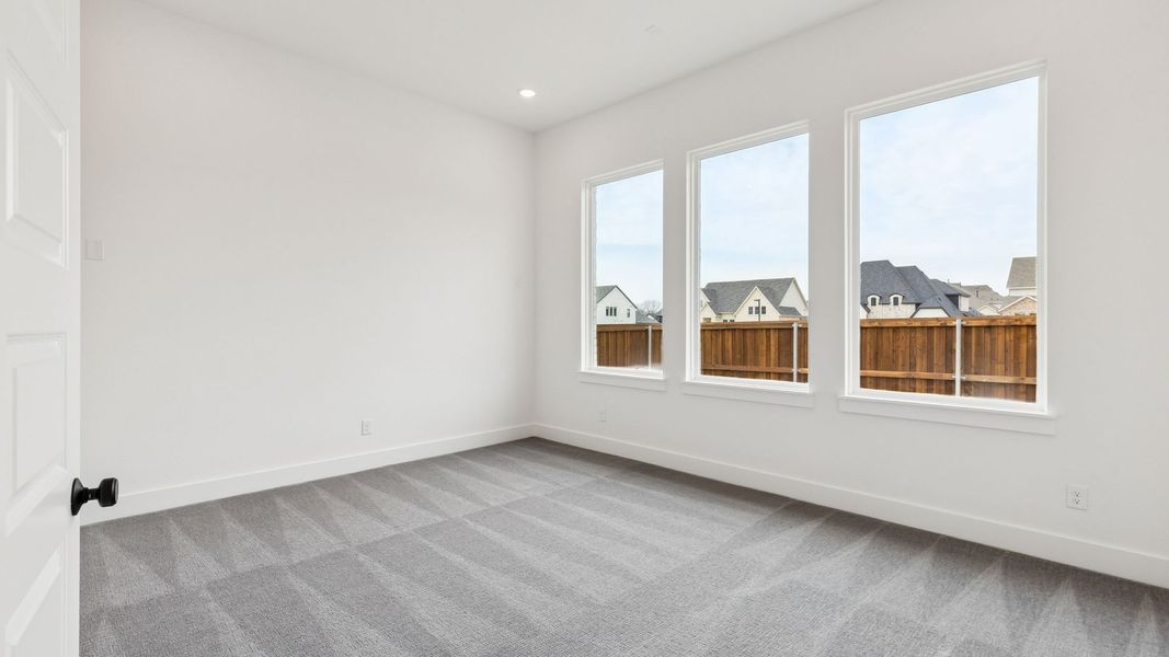 Representative unfurnished interior of a home built from the Reese II by Southgate Homes in The Reserve at Watters, Allen (Image 22).