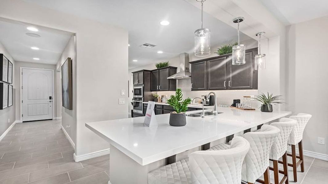 Representative furnished interior of a home built from the Edmonton by Taylor Morrison in Paradisi Discovery Collection, Surprise (Image 9). Representative furnished interior of a home built from the Edmonton by Taylor Morrison in Paradisi Discovery Collection, Surprise (Image 9).