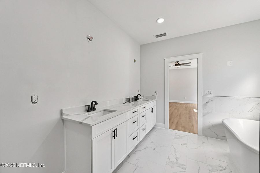 Furnished interior view inside a new home in , Fernandina Beach (Image 10).