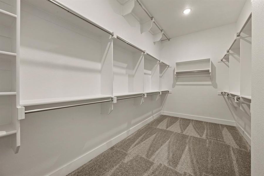 You'll find seasonal hanging racks and plenty of space in this dream closet! You'll find seasonal hanging racks and plenty of space in this dream closet!