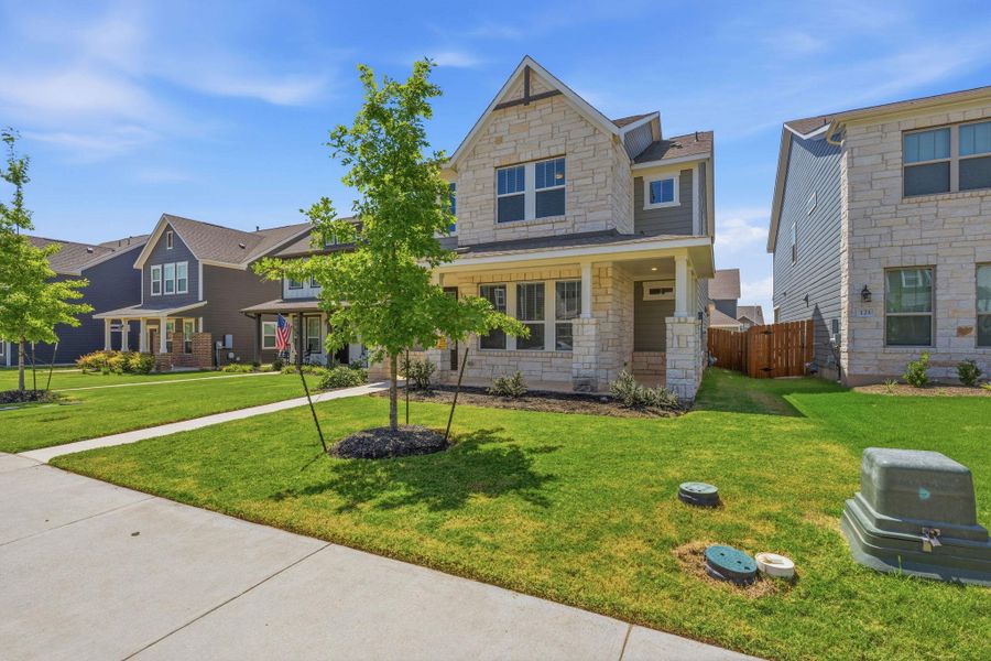 A welcoming stone and siding facade offers classic curb appeal within a neatly maintained neighborhood setting. A welcoming stone and siding facade offers classic curb appeal within a neatly maintained neighborhood setting.