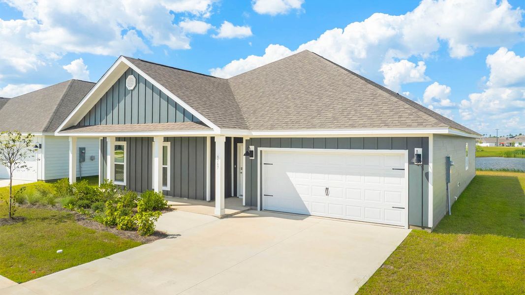 Front exterior of a new home in Liberty, Panama City, FL, highlighting curb appeal (Image 1).