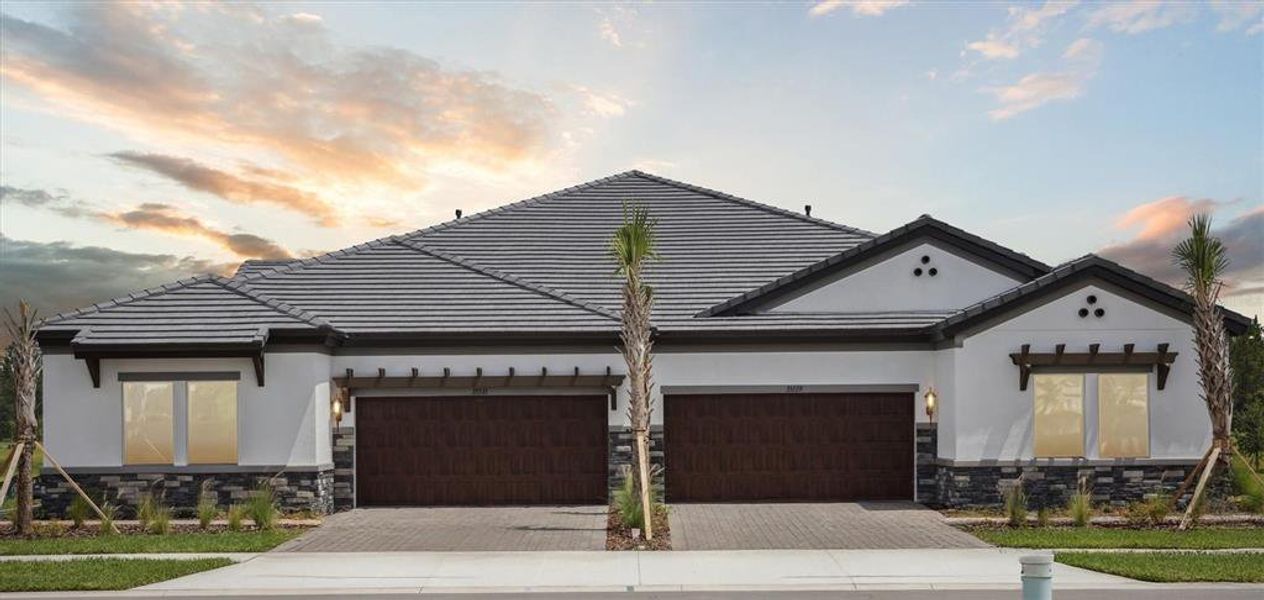 Front exterior of a new home in Two Rivers, Zephyrhills, FL, highlighting curb appeal (Image 18).