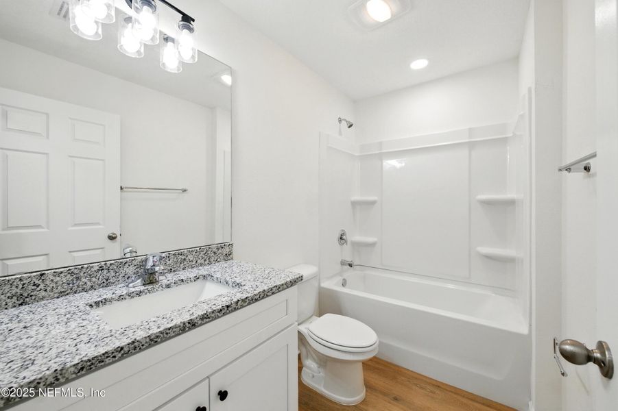 Furnished interior view inside a new home in , Satsuma (Image 5).