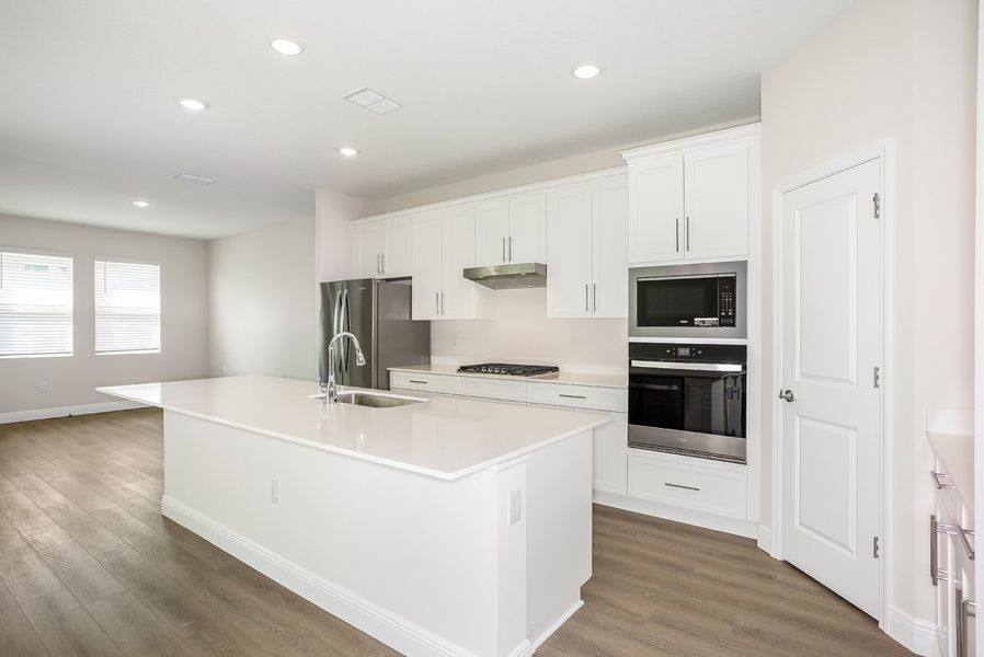 Furnished interior view inside a new home in Pasadena Woods, Dade City (Image 6).