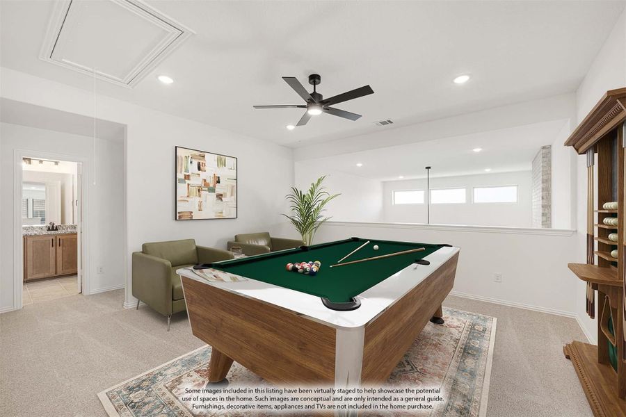 Game room with pool table, ceiling fan, and seating area on carpet flooring Game room with pool table, ceiling fan, and seating area on carpet flooring