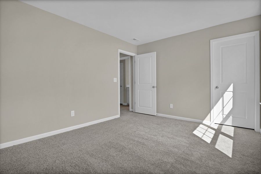 Spacious, unfurnished interior of a new home in Grand Park, Leland (Image 32).