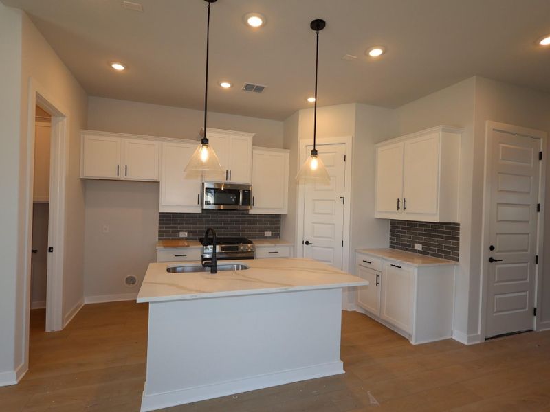 Furnished interior view inside a new home in Cedar Brook, Leander (Image 10).