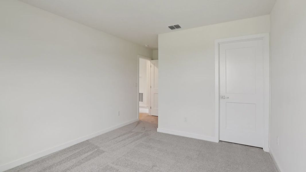Naples Guest Bed with large closet at Grasslands West in Lakeland FL