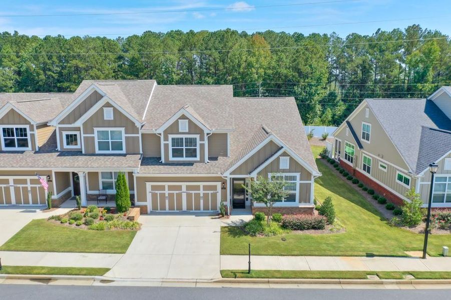 Front exterior of a new home in , Cumming, GA, highlighting curb appeal (Image 1).