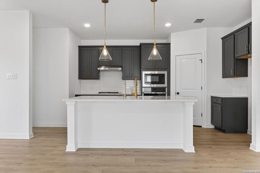 Furnished interior view inside a new home in Hennersby Hollow, San Antonio (Image 13).