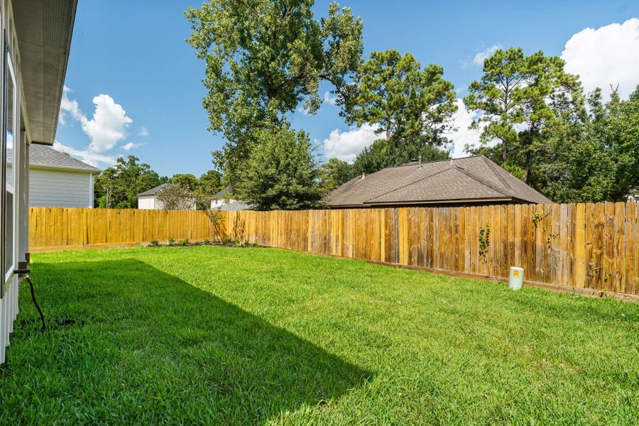 Exterior details and patio area of a home in , Tomball (Image 4).