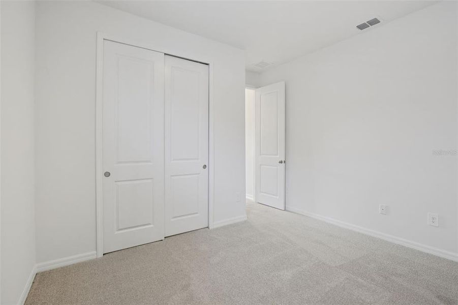 Spacious, unfurnished interior of a new home in Coasterra - Reserve Series, Palmetto (Image 31). Spacious, unfurnished interior of a new home in Coasterra - Reserve Series, Palmetto (Image 31).