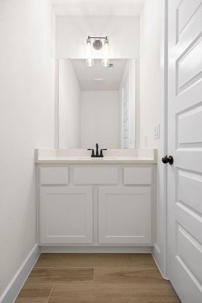 Furnished interior view inside a new home in Bridgeland, Cypress (Image 11).